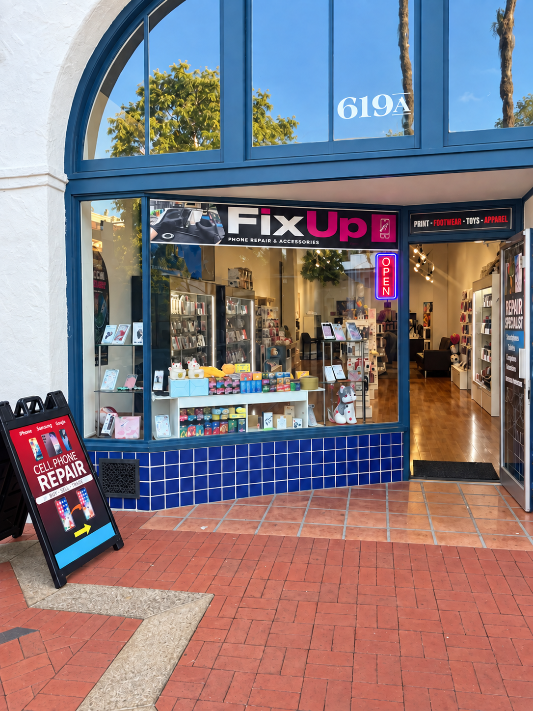 FixUp Santa Barbara storefront with blue arch and open entrance — edited owner-supplied photograph